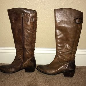 Brown boots with buckle and stud detailing